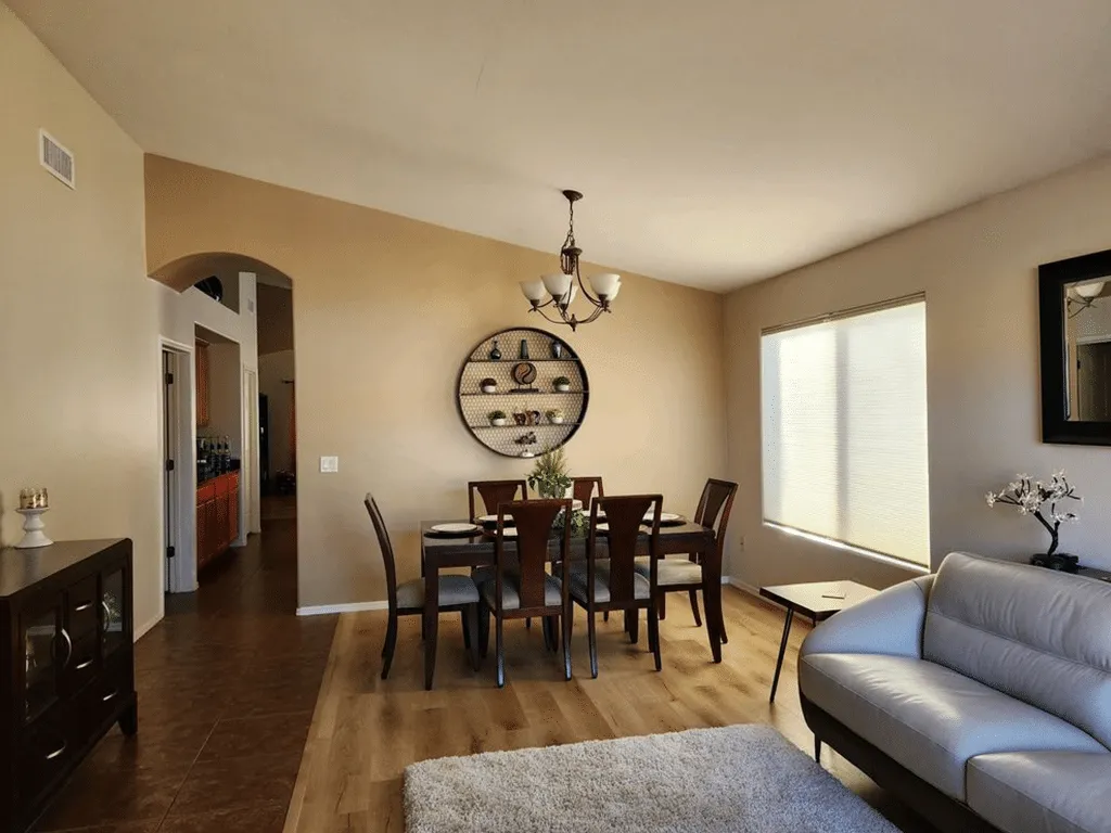 Living and dining room with freshly painted beige walls