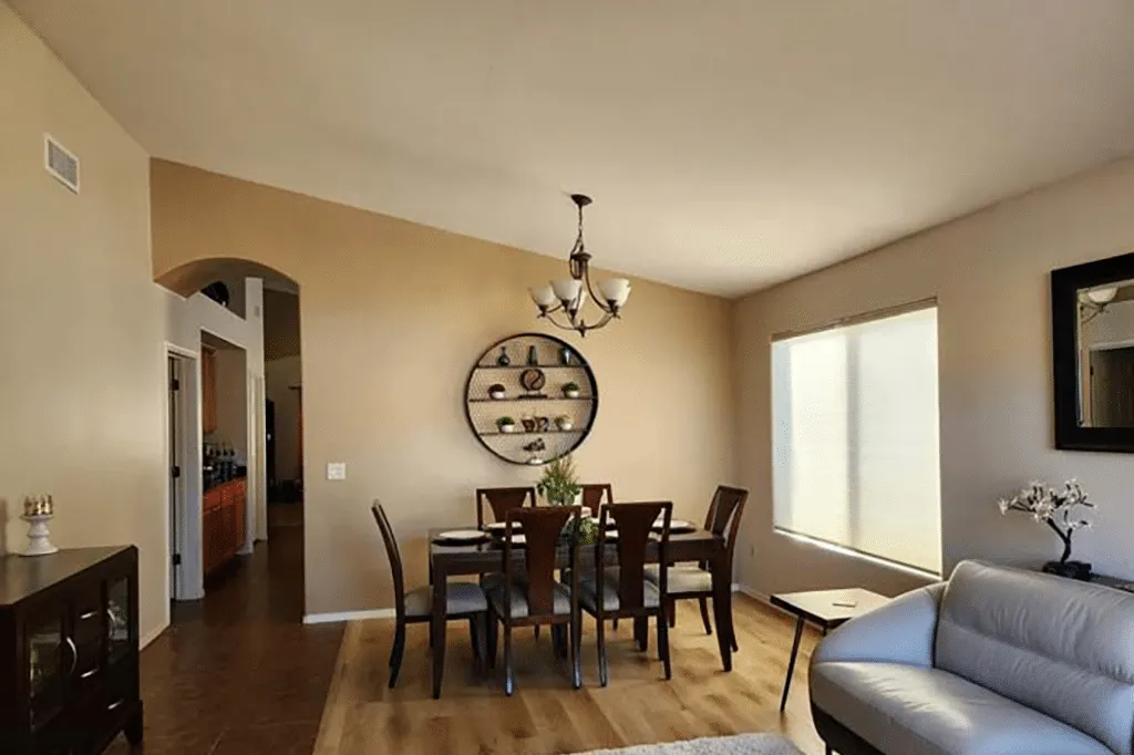 Bright living and dining room with freshly painted warm beige walls